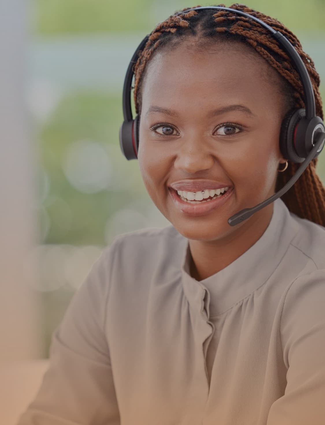 A service support representative greets learners with a warm smile...